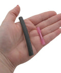 Hand holding Ice Maker Assembly Replacement For Select Refrigerator Models accessories, including short adapter harness