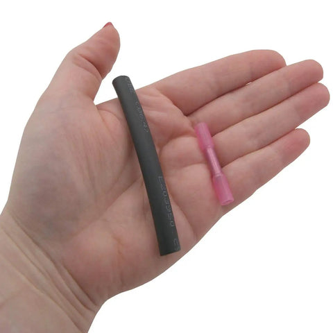 Hand holding Ice Maker Assembly Replacement For Select Refrigerator Models accessories, including short adapter harness