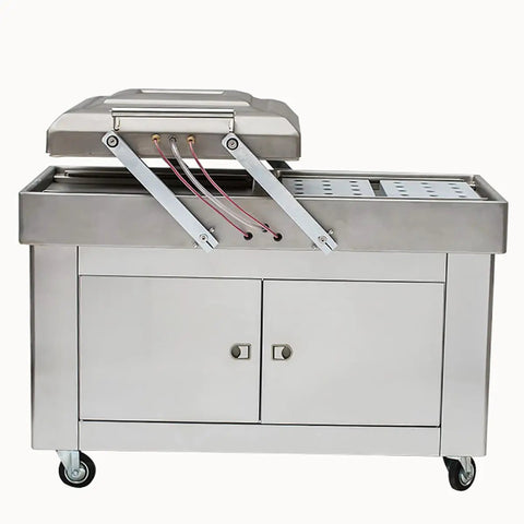 Heavy Duty Double Chamber Vacuum Sealer with stainless steel finish, ideal for sealing meat, seafood, and veggies.