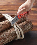 Amazon Basics folding utility knife with red aluminum handle; close-up cutting rope around logs