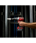 Heavy Duty Compact Hammer Drill Driver With All Metal Chuck And Gears Delivers Hella Tough 500 Inch Pounds Torque For Concrete And Wood Jobsites Worldwide For Pro Contractors in use, drilling through metal framing.