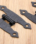 Two Pack Antique Black H Hinges For Cabinets And Boxes, vintage style zinc alloy with screws, rustic home decor on wood surface.