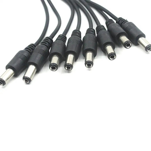 Knockout Heavy Duty Dc 5.5X2.1Mm Power Extension Cord Plug And Play Ac Adapter Splitter Cable With Rugged Pvc Jacket showing multiple connectors.