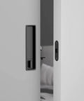 Concealed Edge Pull Pocket Door Lock With Privacy Function For Recessed Sliding Doors Fits Doors With Thickness From One And A Half To Nearly Two Inches Matte Black Rectangle Mortise Lock And Hidden Pull Handle For Seamless Operation.