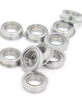 Ten Pack Stainless Steel Flanged Ball Bearings SMF85ZZ Double Shielded Deep Groove Precision Bearings 5x8x2.5mm on white background.