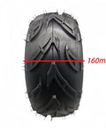 Front view of 7 Inch Right Wheel Rim Tire Assembly For ATVs And Go Karts Fits 50cc 90cc 110cc 125cc Includes 16x8-7 Tire And 79mm Bolt Rim