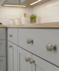 Top Shelf Slick Brushed Satin Nickel Cabinet Knobs With A Hardcore Knurled Shape And Seriously Heavy Duty Build on kitchen drawers.