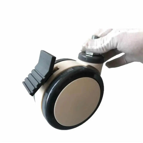 5 Inch Medical Caster Wheels With M12x25 Screw Bearing Brake, side view, held by hand, for hospital cart and hospital bed.