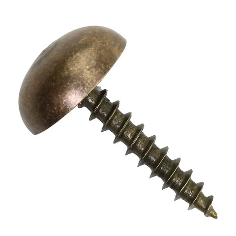 Close-up of 8 Piece Super Clean Pure Brass Decorative Screw with Bronze Cap, 15 mm, for cabinetry and wall panels.