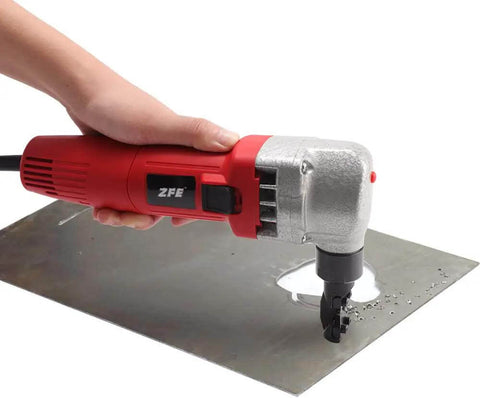 Hand using Metal Nibbler For Sheet Metal Cutting, 380W Power, cutting through metal sheet, high speed rotor, ergonomic slim grip