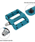 Ultralight Non Slip Nylon Fiber Mountain Bike Pedals Flat Platform Nine Sixteenth Inch Spindle For MTB BMX And Road Cycling Grippy Durable Pedals In Blue, showing anti-slip spikes and corrosion-resistant spindle.