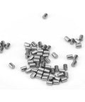 Heavy Duty Hardened Bearing Steel Dowel Pin For Industrial Machinery Build scattered on a white surface, showing precise size and smooth surface.
