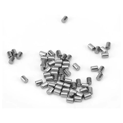 Heavy Duty Hardened Bearing Steel Dowel Pin For Industrial Machinery Build scattered on a white surface, showing precise size and smooth surface.