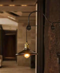 Adjustable Pulley Wall Sconce With Clear Glass Lampshade Straight Up Industrial Rustic Single Head Ceiling Light E27 Bulb Ready Fixture For Bar And Cozy Home Vibes in modern living space.