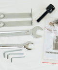 Top view of Bluerock Tools core drill package for concrete coring with wrenches, hex keys, and manual.