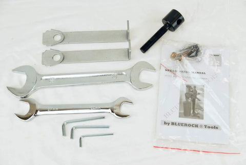 Top view of Bluerock Tools core drill package for concrete coring with wrenches, hex keys, and manual.