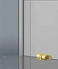 Adjustable Roller Ball Door Catch For Cabinets, Closets, And Wardrobes on gray door floor view, copper bead finish.