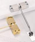 Automatic Home Door Closer With Durable Aluminum Alloy And Cold Rolled Steel Build, Smooth Quiet Self-Closing, silver and gold finish.