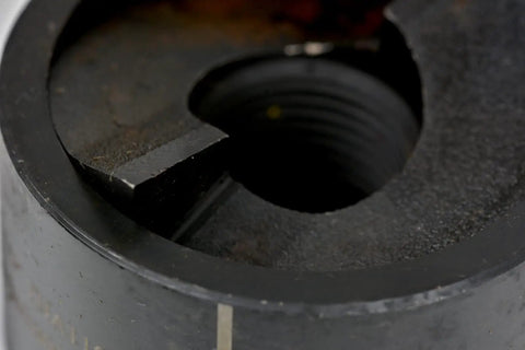 Close-up of slug splitting conduit punch die for hydraulic knockout driver, 1-1/4 inch fitting, 9 ton punching force