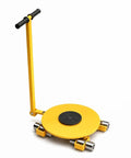 Heavy Duty Machinery Skates For 12 Ton Loads Built Tough With Rugged Steel Casters And Dual Ball Bearings For Smooth Equipment Transport No Sweat Handling In Any Warehouse Or Job Site. Yellow dolly with rubber pad and durable casters.