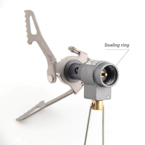 Close-up of Ultra Lightweight Titanium Gas Stove For On The Go Camping And Picnics showing sealing ring and connector