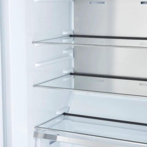 Interior of Pro Grade Built In Convertible Refrigerator And Freezer Combo With No Sweat Inverter Cooling 13.6 Cu Ft Capacity showing glass shelves.