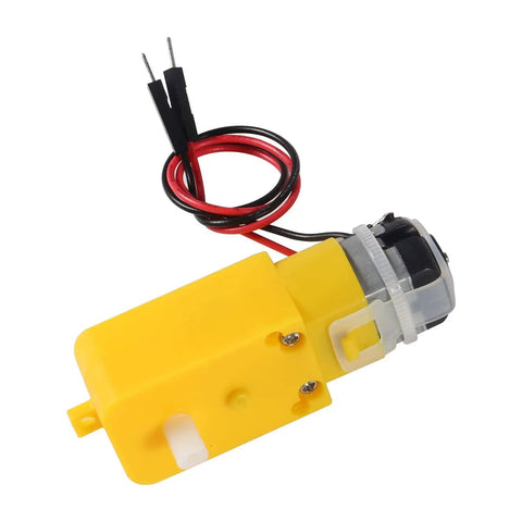 Single unit from Six Pack Prewired DC Gear Motors With Dual Shaft For DIY Smart Car Robots And Four Wheel Drive Toy Cars 3V To 6V Operation High Torque No Load Speed 1 To 48 Ideal For RC Projects. Yellow plastic casing and wires visible.