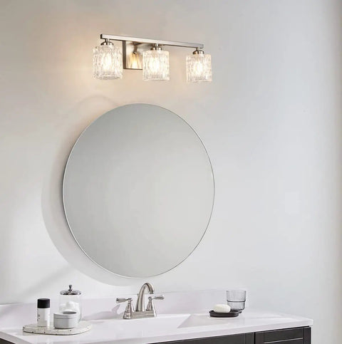 Sleek Modern Bathroom Light Fixtures With Three Crystal Glass Vanity Lights Over Mirror In Brushed Nickel Finish G9 Bulb Not Included