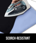Ironing on a Magnetic Ironing Blanket Travel Size 28x24 with Silicone Coating Scorch Resistant Up To 400 Degrees.