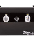 Dual Shooting Gallery Airgun Target with Knockdown Reset, all-metal pellet trap on black, front view showing Sig Sauer logo and center reset icon