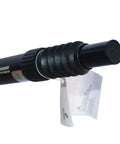 Close-up of 27.2mm Suspension Seatpost Shock Absorber for Road Bikes with coil spring and tag, black aluminum