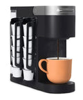 Side Mount K Cup Coffee Pod Holder For Keurig Two Pack Black Slim Organizer That Fits Ten Pods next to a coffee machine.