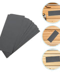 Premium Wet Dry Sandpaper Sheets For Auto Metal Finishing Perfect Grit Pack displayed on a wooden surface for effective detailing.