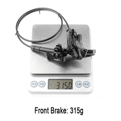 Front Hydraulic Disc Brake Kit For Mountain Bikes And Ebikes With Two Piston Aluminum Caliper PM IS Adapter Mount fits 160mm rotor on scale showing 315g