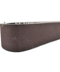 Close-up of HPG120-10 One And One Half Inch By Thirty Inch Aluminum Oxide Sanding Belt, 120 Grit showing edge and texture, ten pack.