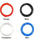 Four rolls of tubing in orange, black, transparent, and blue colors.