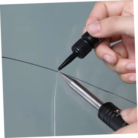 Close-up of Powerful Windshield Crack Repair Kit For Quick Easy Fixes And Large Area Cracks Tool Set being used on auto glass