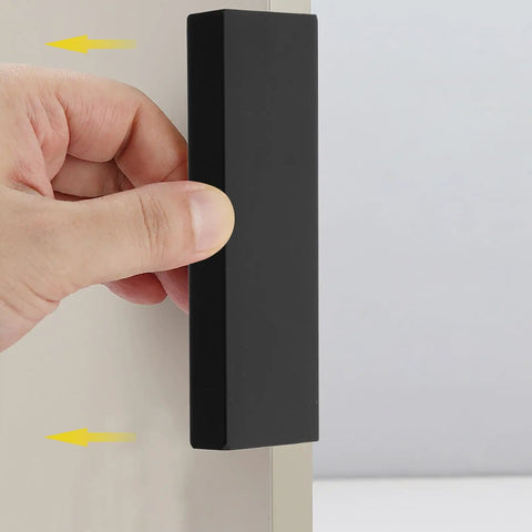 Slick Matte Black Recessed Cabinet Handles Edge Pulls for Sliding Doors and Drawers with easy embed install in hand demonstration.