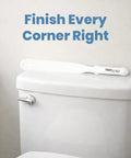 Paint Behind Toilet Tool Kit With 12-Inch Reach Flat Brush for narrow spaces behind toilets, shown on a toilet tank