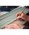 Person marking wood using a Pro Grade 106 Inch Guide Rail 2700mm For Straight, Splinter Free Cuts With Track Saws And Routers, Glue Ready Joints