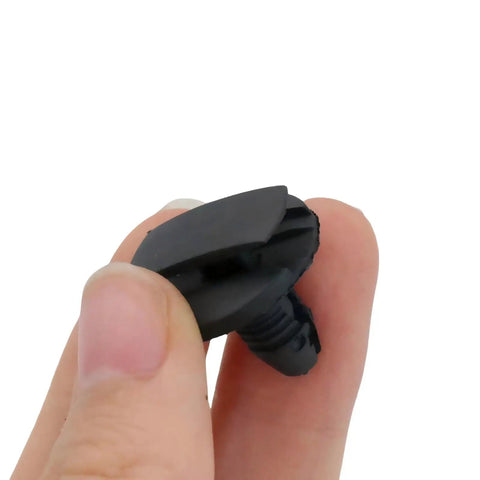 Close-up of a black trim clip from the 20 Piece Engine Compartment Trim Clip Fasteners For Porsche Cayenne 2011 To 2018 Heat Resistant Plastic.
