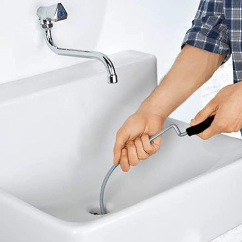 Pro Grade 10 Foot Metal Drain Cleaner and Clog Remover With Flexible Drain Snake being used in a sink