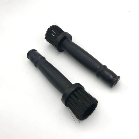 Two black Wheel Lug Nut Cleaning Brush Set For Car Detailing Kit Chrome Closed End Bulge Acorn Lug Nut Covers on white background