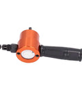 Electric Nibbler Attachment For Metal Cutting With 360 Degree Rotating Double Head Cutter, side view of orange tool with black handle.