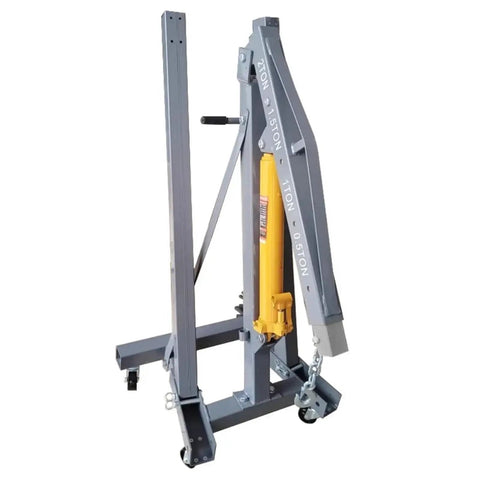 Heavy Duty 2 Ton Hydraulic Engine Hoist And Foldable Shop Crane With Hand Pump for smooth auto repairs in garage.