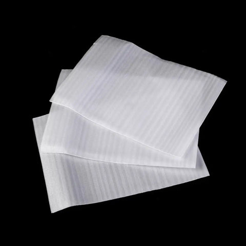 Foam Cushioning Pouches Pro Grade Pack of 100 full coverage EPE pearl cotton wrap for fragile items and cups, shown stacked on black