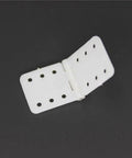 11x25.5 mm Pinned Nylon Hinge for RC Airplane Replacement, small folding plane hinge with 1.0 mm pin, unfolded view on black background