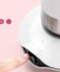 Smart Two In One Electric Cup Warmer And Rapid Beverage Chiller For Office Desk with control button and stainless steel cup.