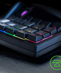 Close-up of Mecha-Membrane Gaming Keypad with 32 Programmable Keys, Customizable RGB Lighting, Macro Powerhouse For One Handed Control.