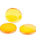 Three 20mm diameter CO2 laser focal lenses with yellow-orange tint.